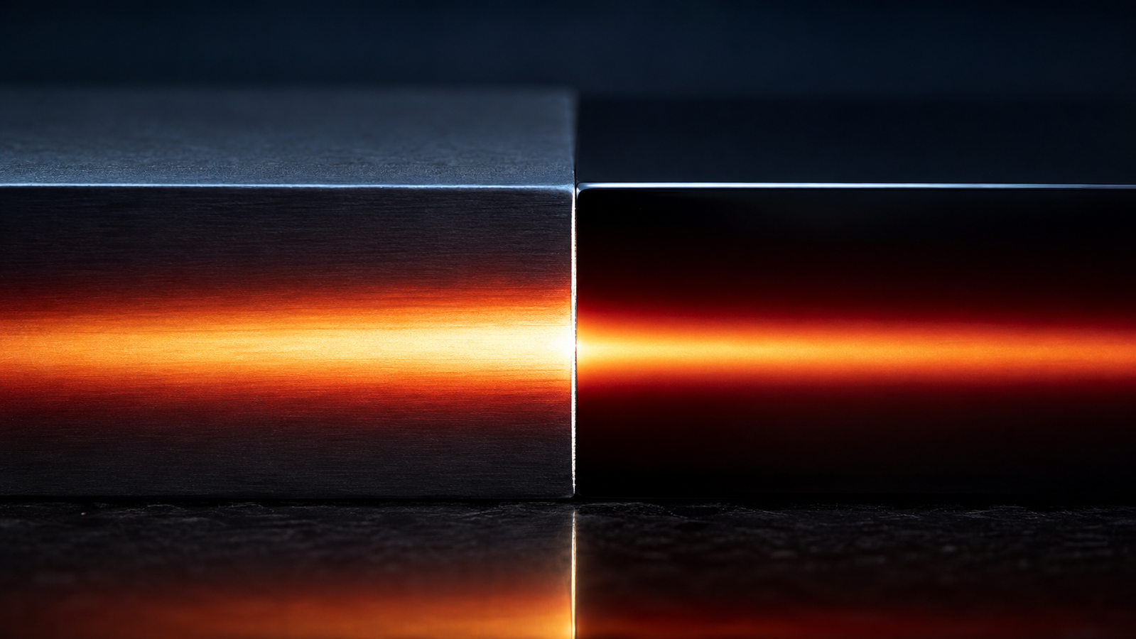 A cross-section of two dark polished slabs pressed together in a black void, a river of warm amber light flowing through them — smooth and bright inside each slab, but at the razor-thin seam between them the glow abruptly steps down in brightness, a visible cliff of light at an almost invisible boundary