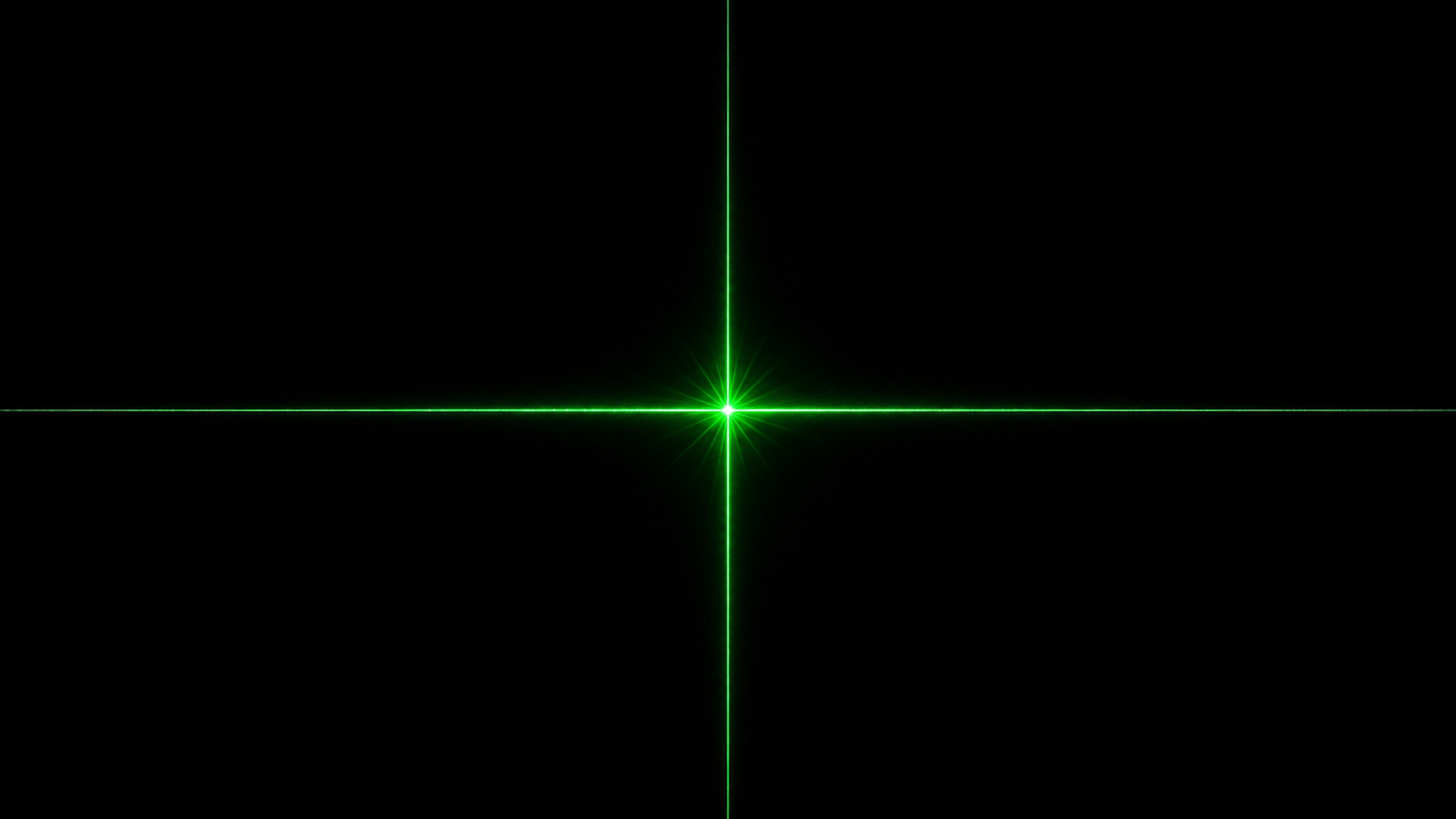 A thin vertical emerald-green laser line crossing a single straight dark fiber on black, a small green starburst blooming at the intersection
