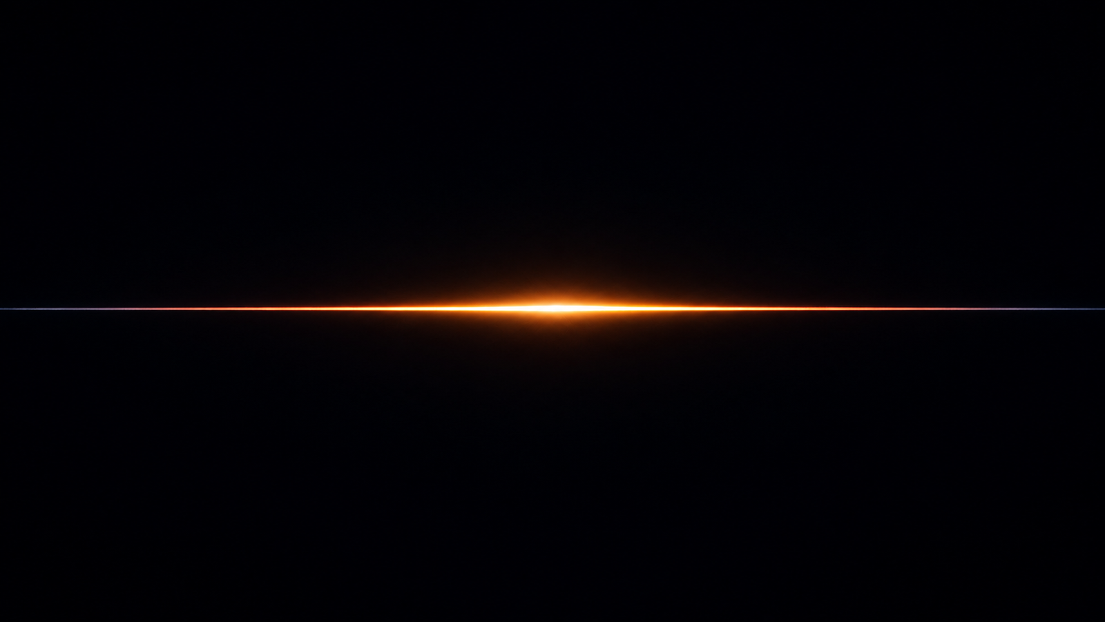 A slender specimen suspended between two contact posts inside a dark instrument bay, glowing faintly along its length; behind it, a soft grid of light suggests an automated interface quietly reading the transient — the machine present only as ambient glow, the sample unmistakably the protagonist